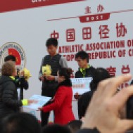 Presenting "checks" to the 1/2 marathon winners.